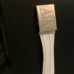 White canvas and patent leather Armani exchange belt